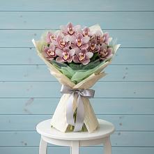 Букет цветов из:  Орхидеи и Розы в Магнитогорске